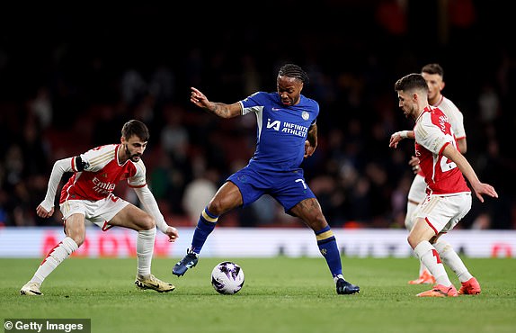 LONDON, ENGLAND - APRIL 23: Raheem Sterling of Chelsea Jorginho and Kai Havertz of Arsenal during the Premier League match between Arsenal FC and Chelsea FC at Emirates Stadium on April 23, 2024 in London, England. (Photo by Julian Finney/Getty Images)